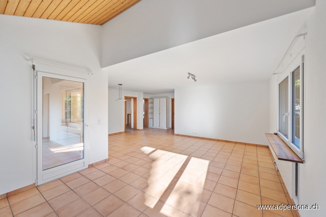 Wohnzimmer, links der Wintergarten Einfamilienhaus Liestal